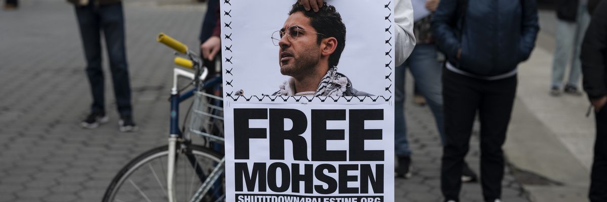 People take part in a protest to demand the release of Palestinian activist and Columbia University student Mohsen Mahdawi 